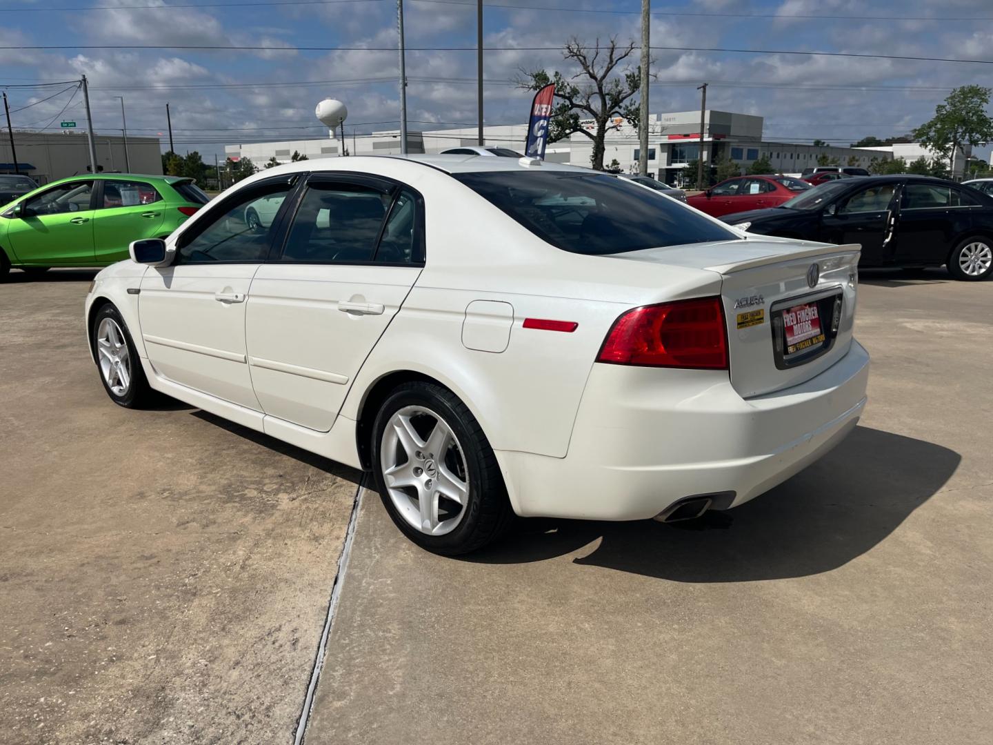 2006 white /TAN Acura TL 5-Speed AT (19UUA66206A) with an 3.2L V6 SOHC 24V engine, 5-Speed Automatic Overdrive transmission, located at 14700 Tomball Parkway 249, Houston, TX, 77086, (281) 444-2200, 29.928619, -95.504074 - Photo#4